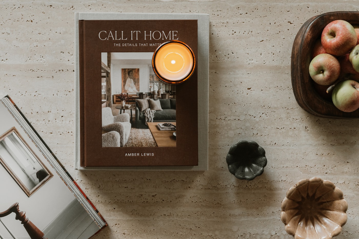 A candle and a book — a quiet corner for the home